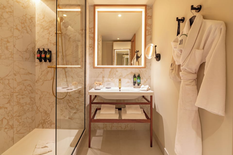 Eco-friendly toiletries, hair dryer, bathrobes, slippers