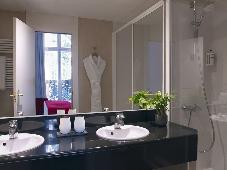 Eco-friendly toiletries, hair dryer, towels