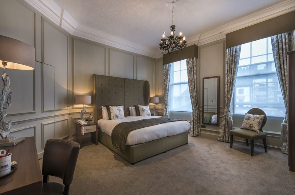 Deluxe Double Room | Desk, laptop workspace, blackout drapes, iron/ironing board