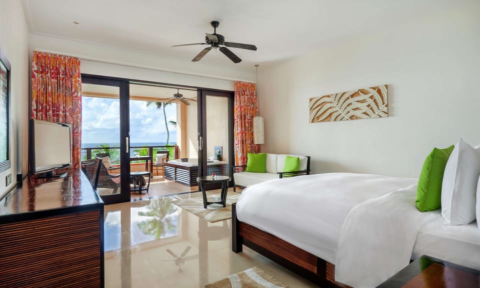 Grand Room, 1 King Bed, Beach View, Jacuzzi on Balcony | Hypo-allergenic bedding, minibar, in-room safe, desk
