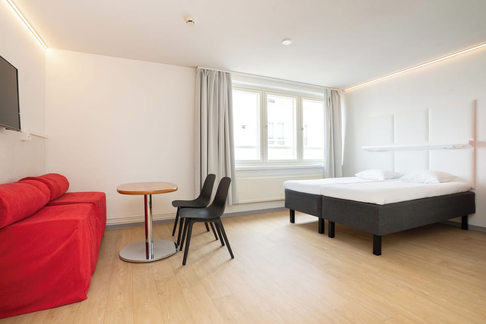Blackout drapes, soundproofing, free WiFi, bed sheets