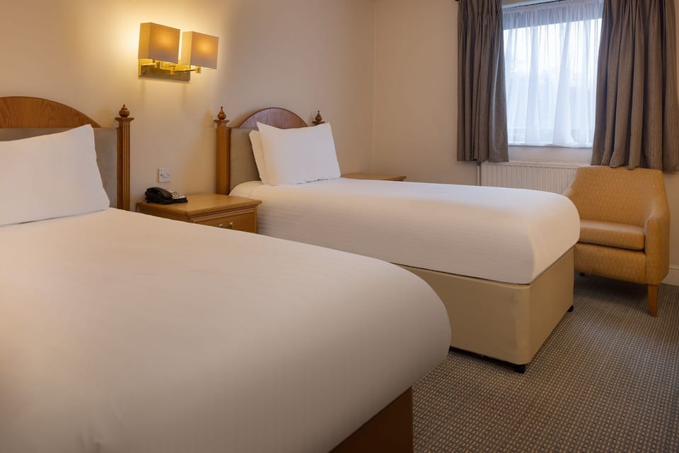 Standard Twin Room | Hypo-allergenic bedding, desk, laptop workspace, iron/ironing board