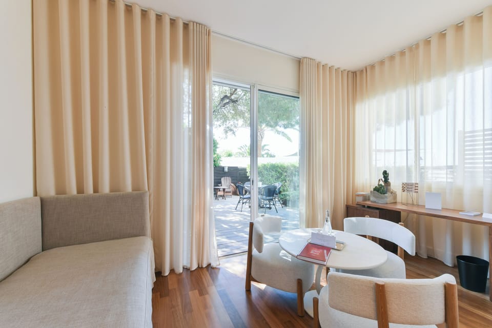 Junior Suite, 1 King Bed, Patio, Sea View | Premium bedding, free minibar, in-room safe, iron/ironing board