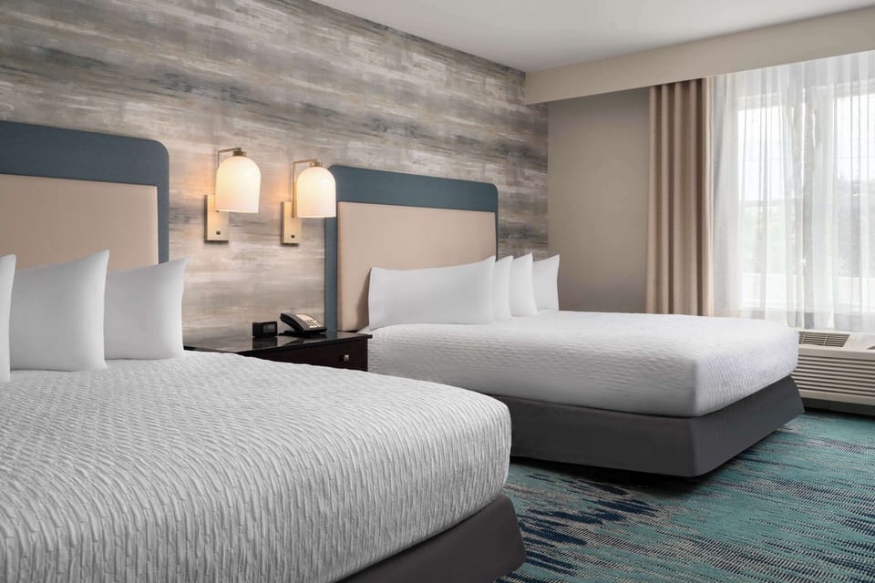 Suite, 2 Queen Beds, Non Smoking | In-room safe, desk, cribs (free), rollaway beds (free)