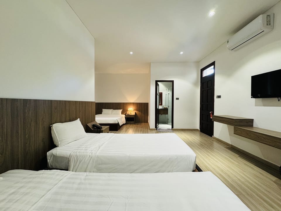 Deluxe Family Room, Garden View (4pax) | Minibar, in-room safe, desk, blackout drapes