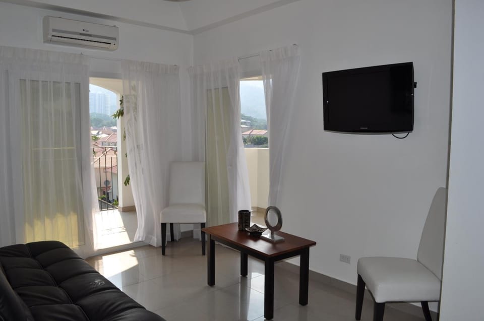 Business Apartment, 1 King Bed, Non Smoking, Mountain View | Living room | 37-inch LCD TV with cable channels, TV