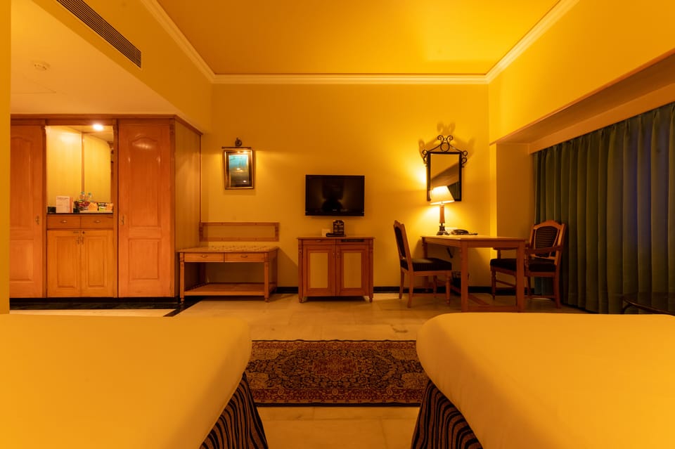 Free minibar items, in-room safe, desk, laptop workspace