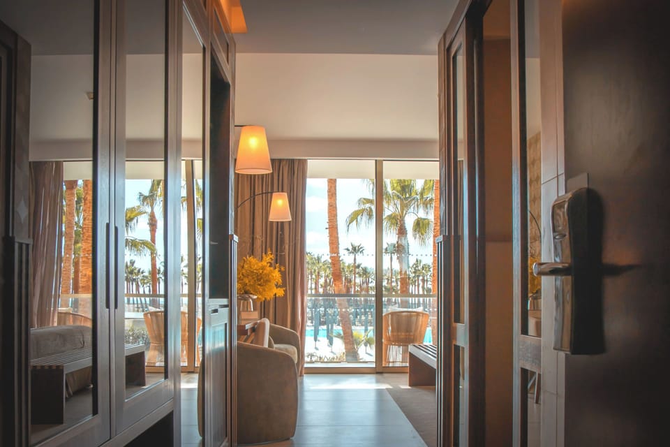 Superior Double Room, Pool View | Minibar, in-room safe, desk, blackout drapes