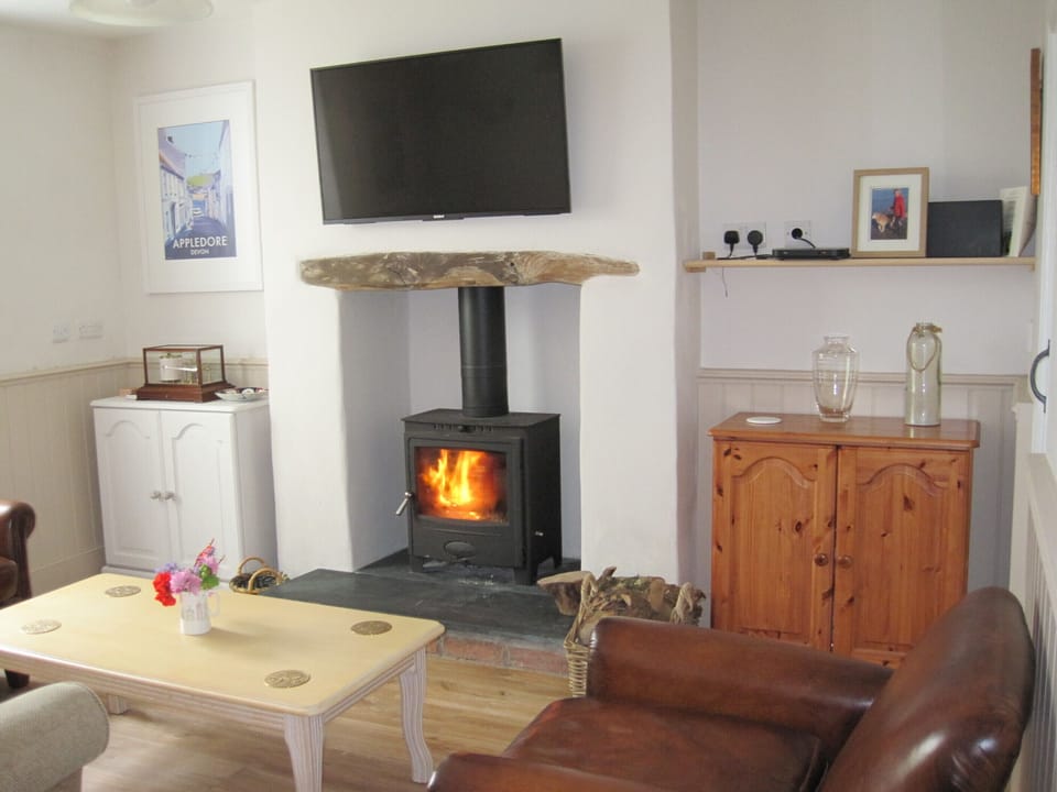 Snug with wood burner and Sky tv.