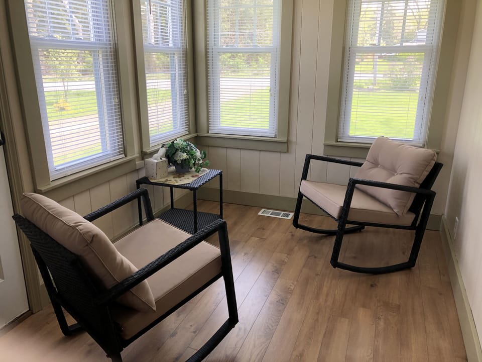 Enjoy morning coffee or a nice summer breeze in the sunroom
