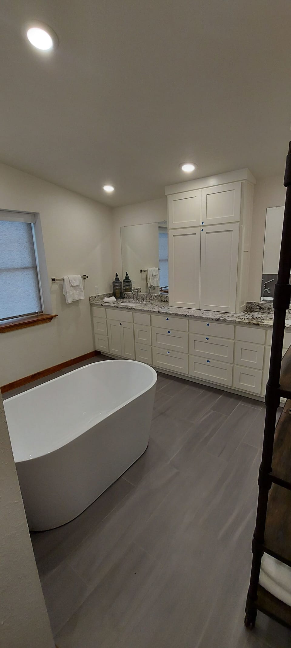 Master bath with large soaking tub and double vanity