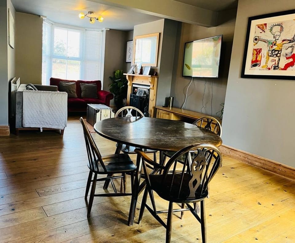 Luxury Cottage | Living area | 32-inch Smart TV with digital channels, TV, streaming services