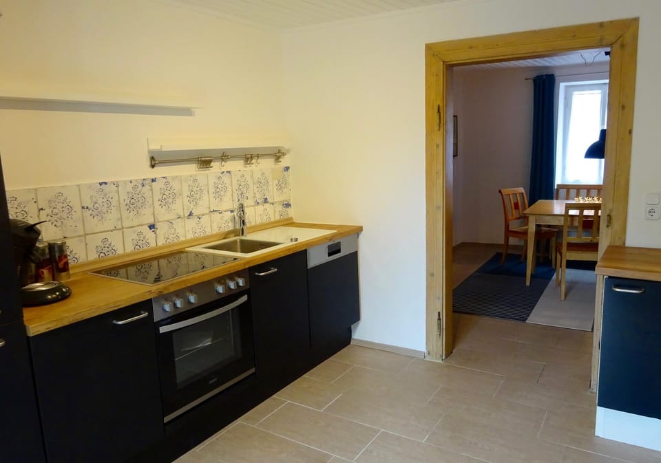 Apartment | Private kitchen | Fridge, oven, stovetop, dishwasher