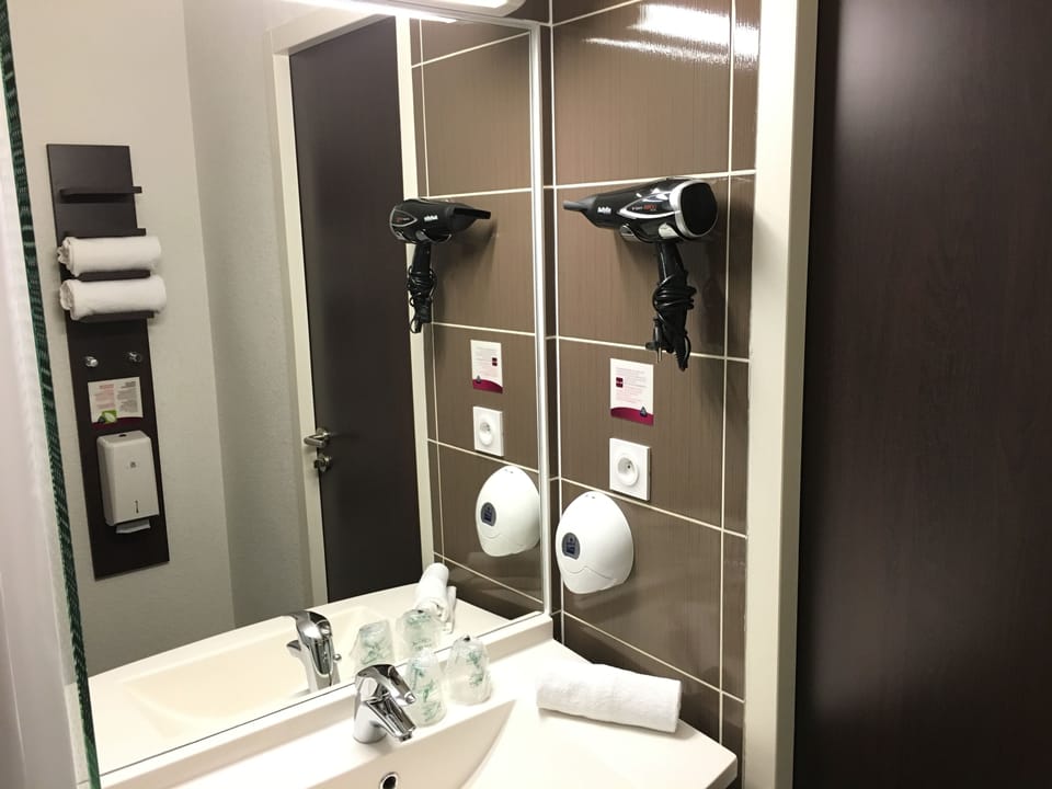 Shower, eco-friendly toiletries, hair dryer, towels