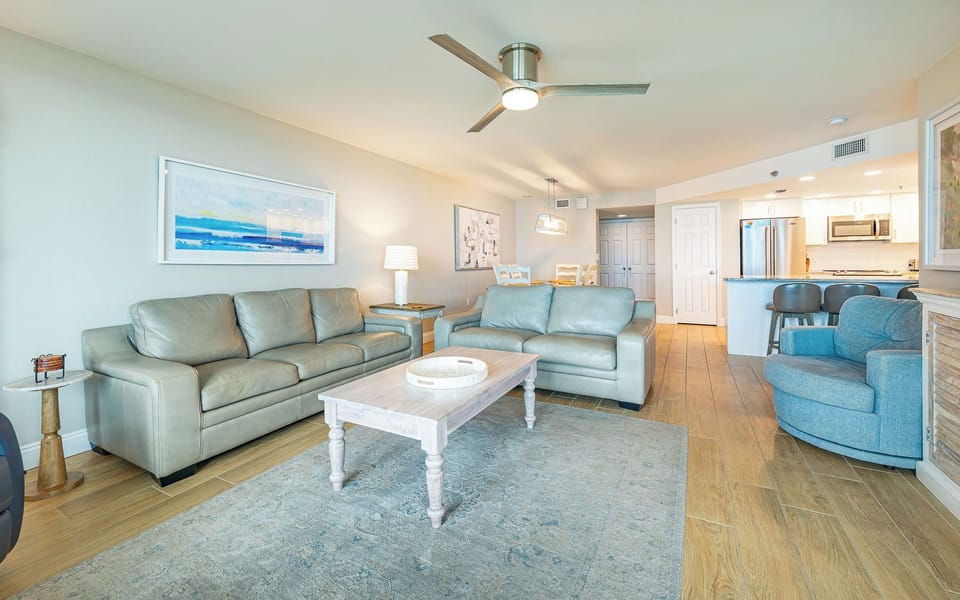 Gather on plush seating to chat, while enjoying the warm vibe and gentle breezes from your balcony