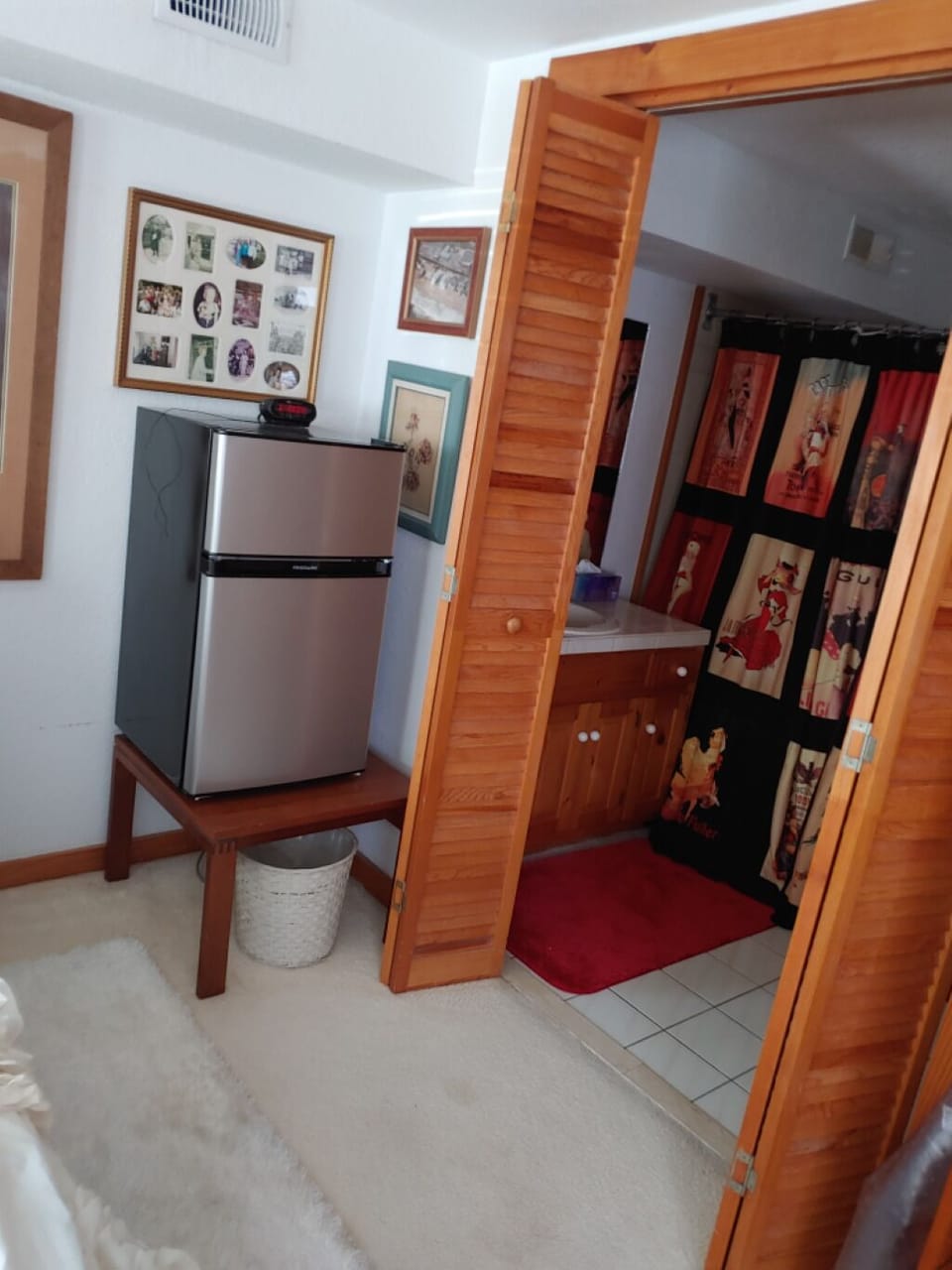 Refrigerator
Large bathroom with shower and sunken tub