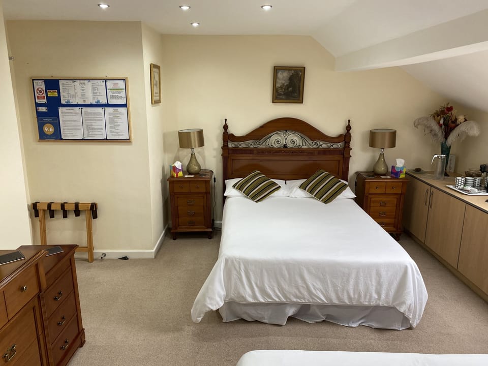 Main double bed next to door