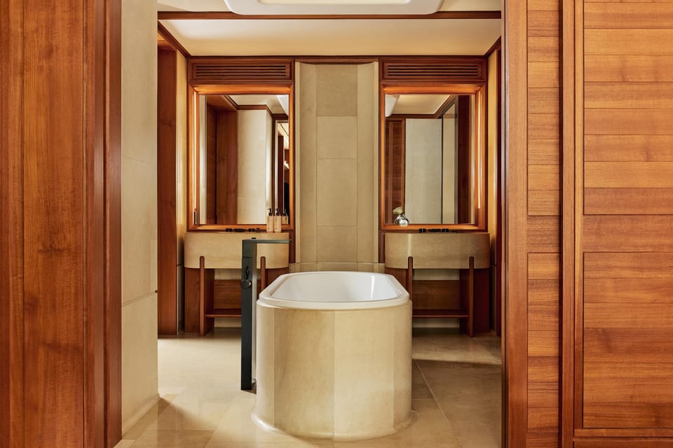 Terrace Junior Suite | Bathroom | Combined shower/tub, deep soaking tub, designer toiletries, hair dryer