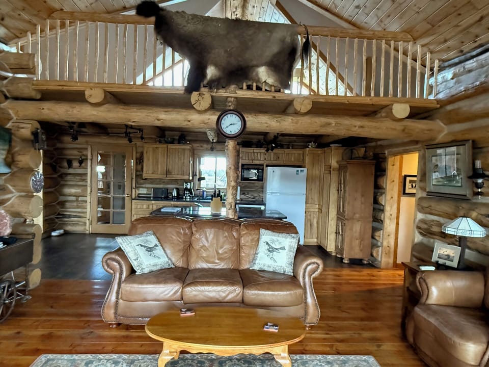 Living room with. loft above