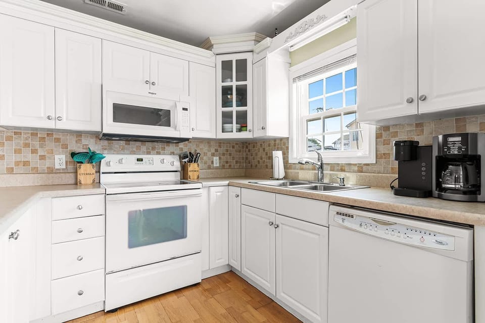 Bright, airy kitchen with modern appliances and cozy charm