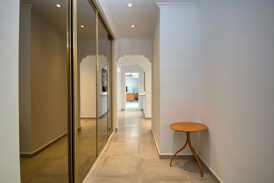 Corridor to the living room; Here you have big wardrobe with mirrors;