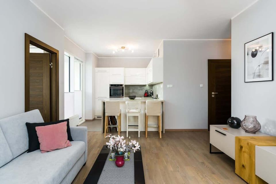A wider shot of the same space, showing a more comprehensive view of the living and dining arrangement.