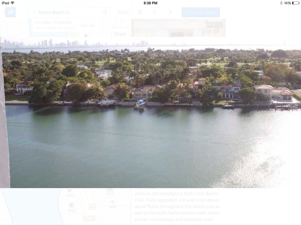 Balcony view of intercostal waterway, Miami skyline, and La Gorce golf course 