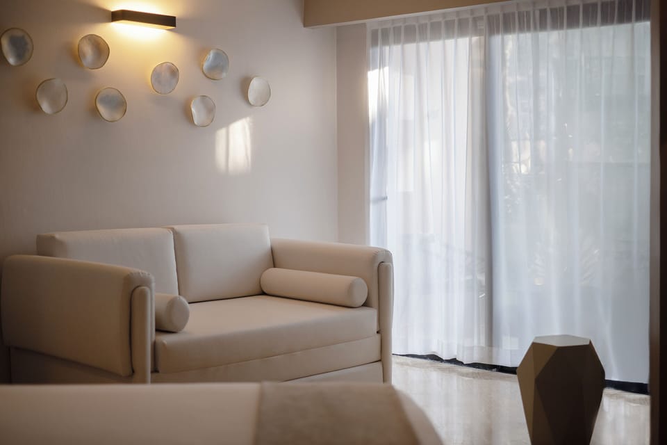 Down comforters, memory foam beds, free minibar, in-room safe