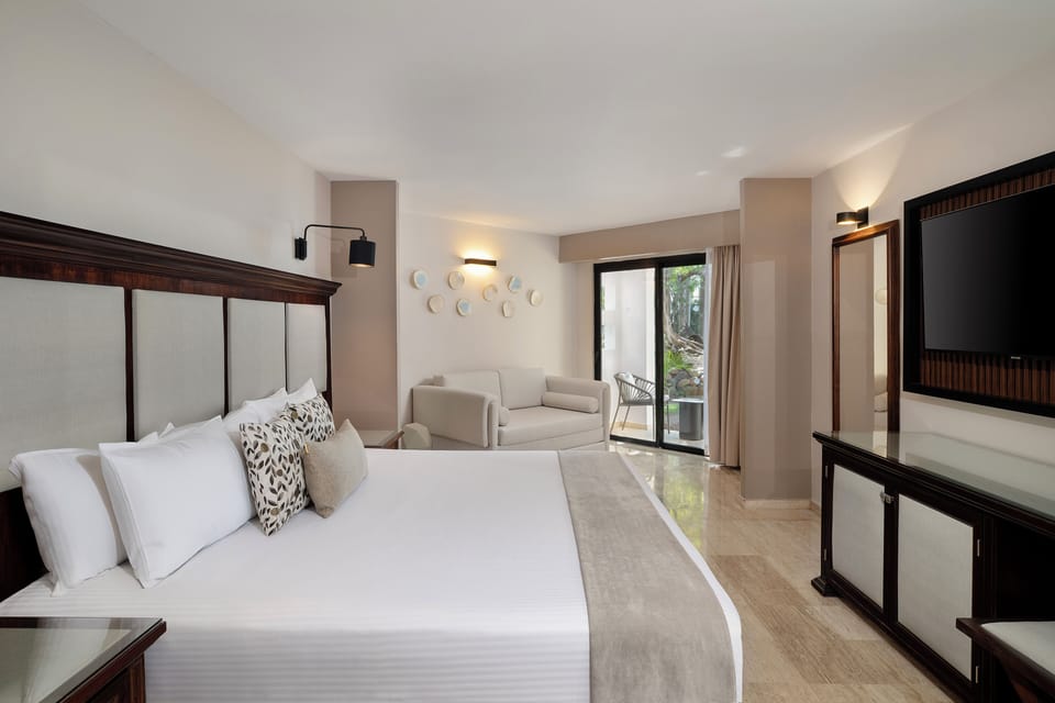 Down comforters, memory foam beds, free minibar, in-room safe