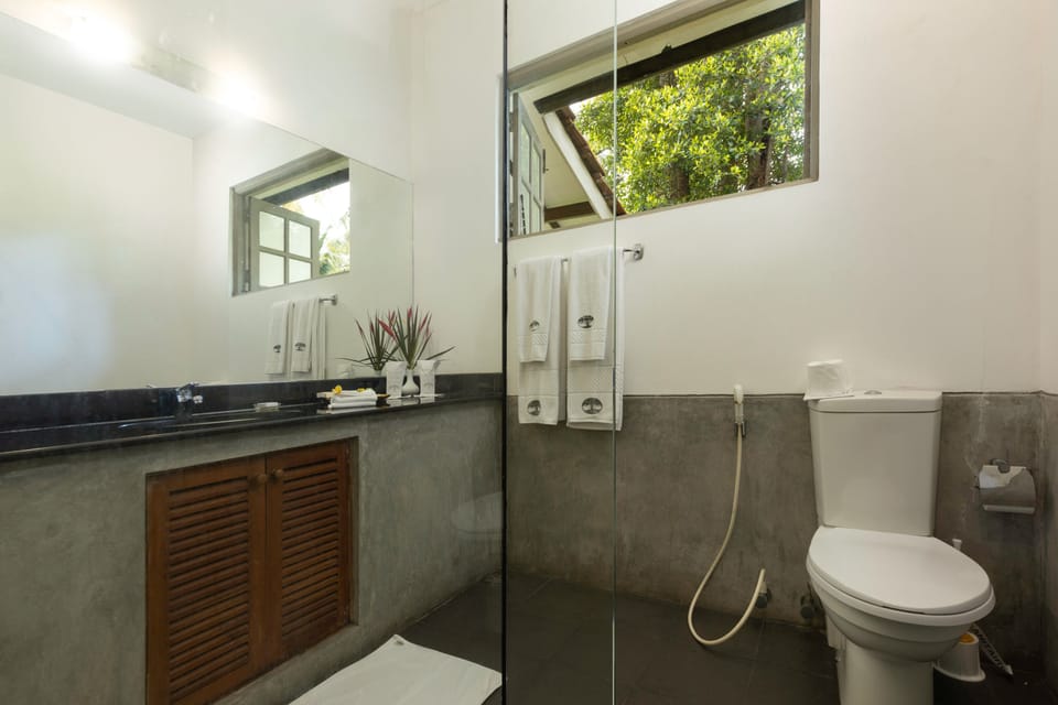 Shower, bathrobes, slippers, bidet