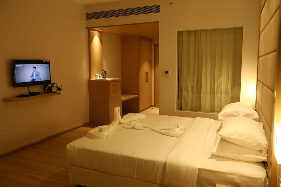 Premium bedding, memory foam beds, minibar, in-room safe