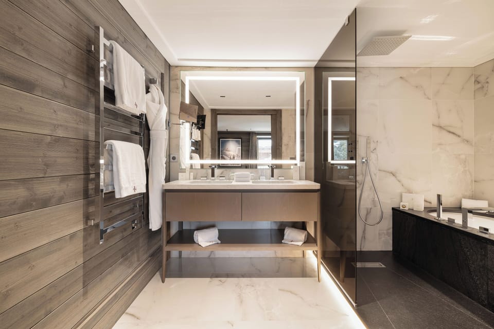 Executive Room | Bathroom | Designer toiletries, hair dryer, bathrobes, slippers