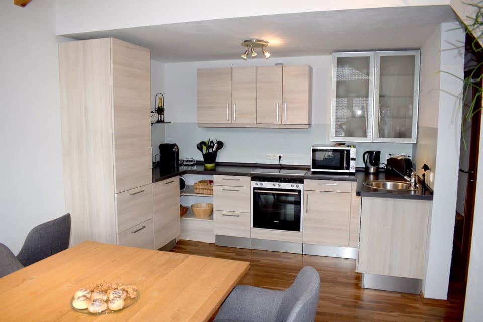 Apartment | Private kitchen | Full-size fridge, microwave, dishwasher, electric kettle