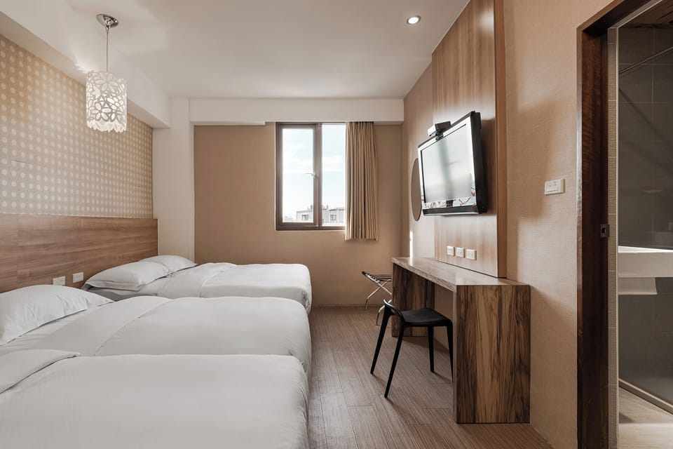 Family Room | Down comforters, desk, blackout drapes, free WiFi