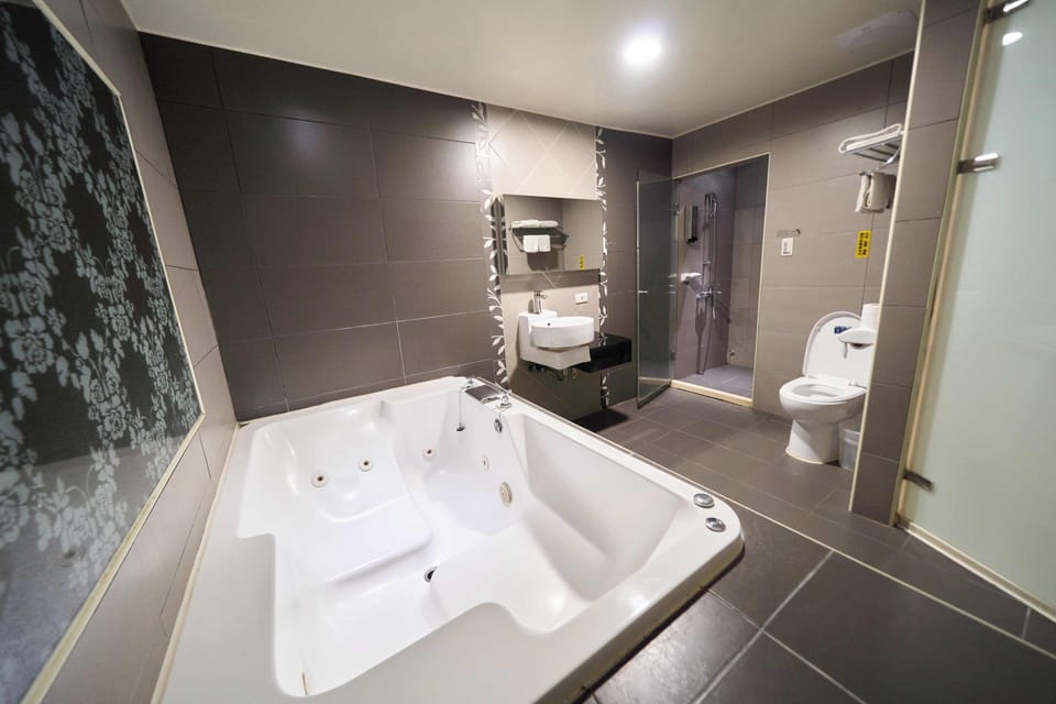Superior Double Room | Bathroom | Hair dryer, slippers, towels, soap