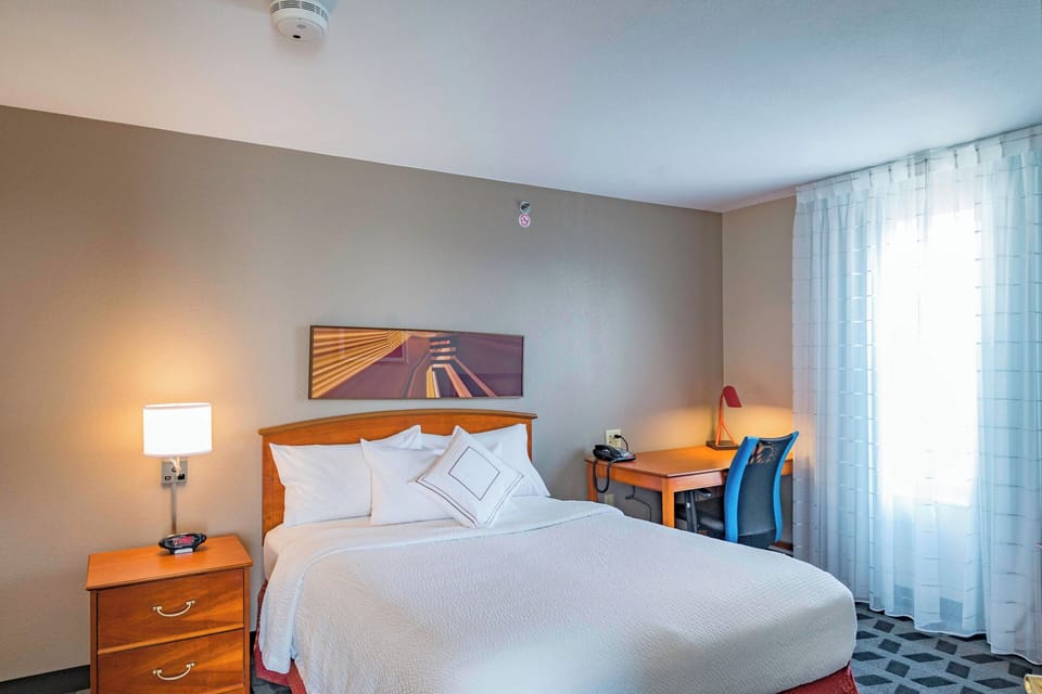 Suite, 2 Bedrooms | Individually furnished, desk, laptop workspace, blackout drapes