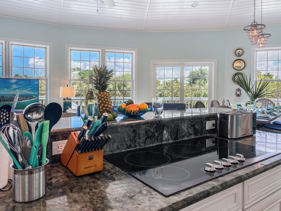 This kitchen is a chef's dream - fully stocked with sharp knives, cooking and baking essentials, full-sized appliances including two ovens, and enough counter space that your sous-chef can enjoy the prep space with you.