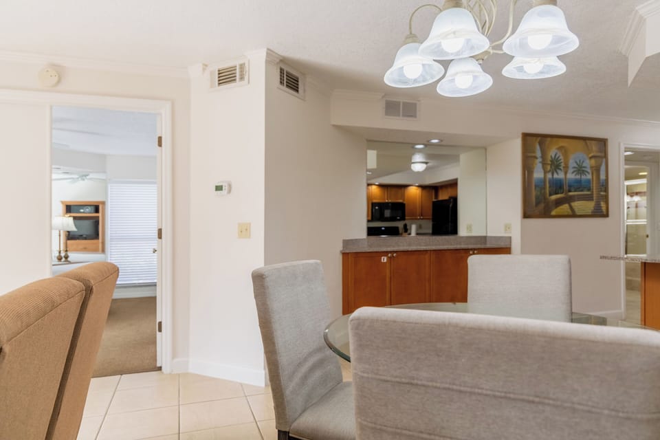 Deluxe Suite, 2 Bedrooms | Living area | 40-inch flat-screen TV with cable channels, TV, DVD player