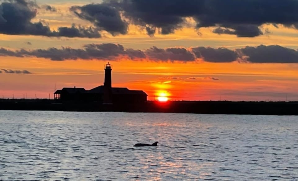 Sunset at the lighthouse near the Port Aransas Harbor