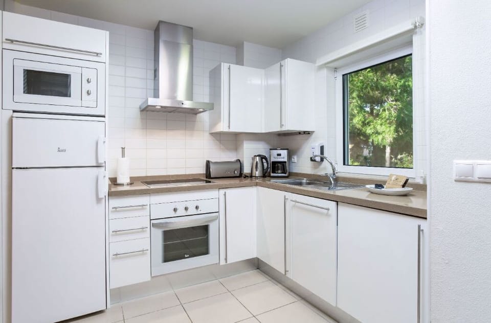 Streamlined kitchen with modern amenities.