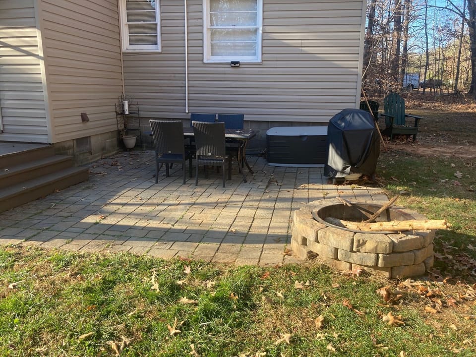 Patio, with patio table & chairs, gas grill & fire pit (firewood in deck box)