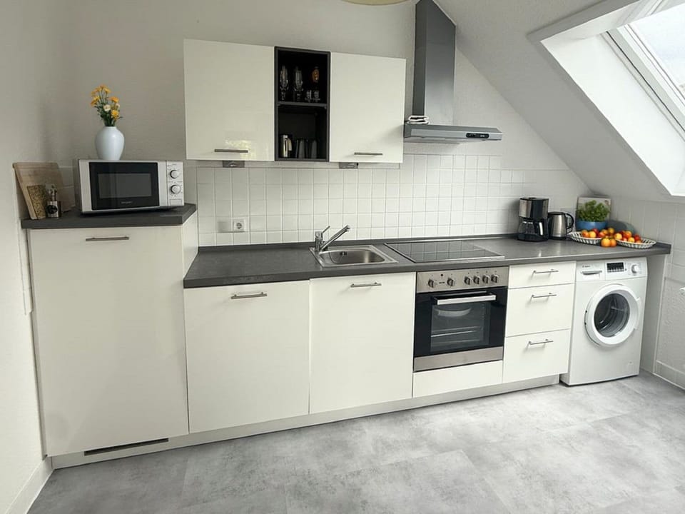 Apartment | Private kitchen | Fridge, stovetop, dishwasher, coffee/tea maker