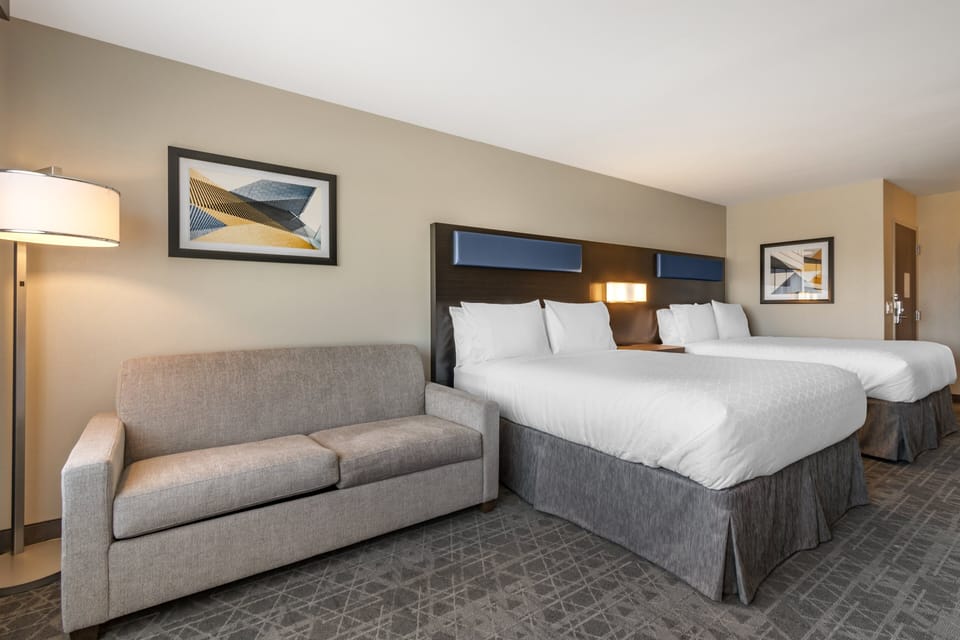 Suite, 2 Queen Beds (Additional Living Area) | In-room safe, desk, laptop workspace, blackout drapes