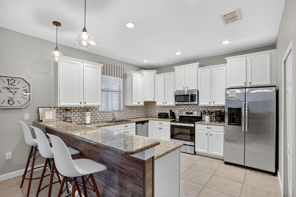Breakfast Counter And Full Modern Kitchen