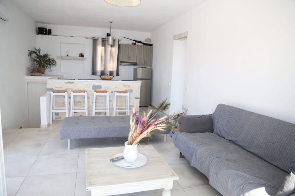 Villa, 2 Bedrooms, Private Pool, Sea View | Living area | 32-inch flat-screen TV with cable channels, TV, fireplace