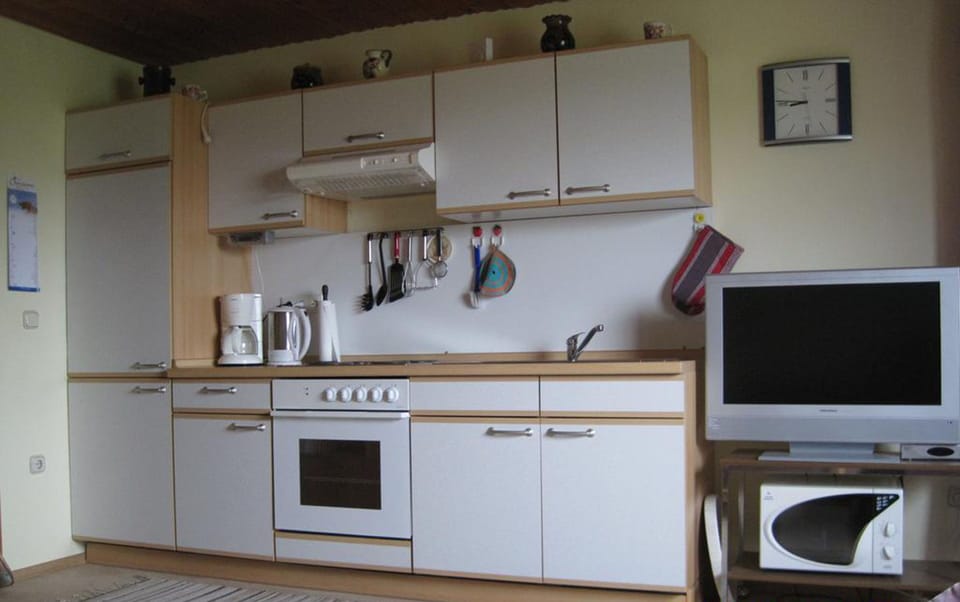 Apartment | Private kitchen | Fridge, microwave, oven, coffee/tea maker