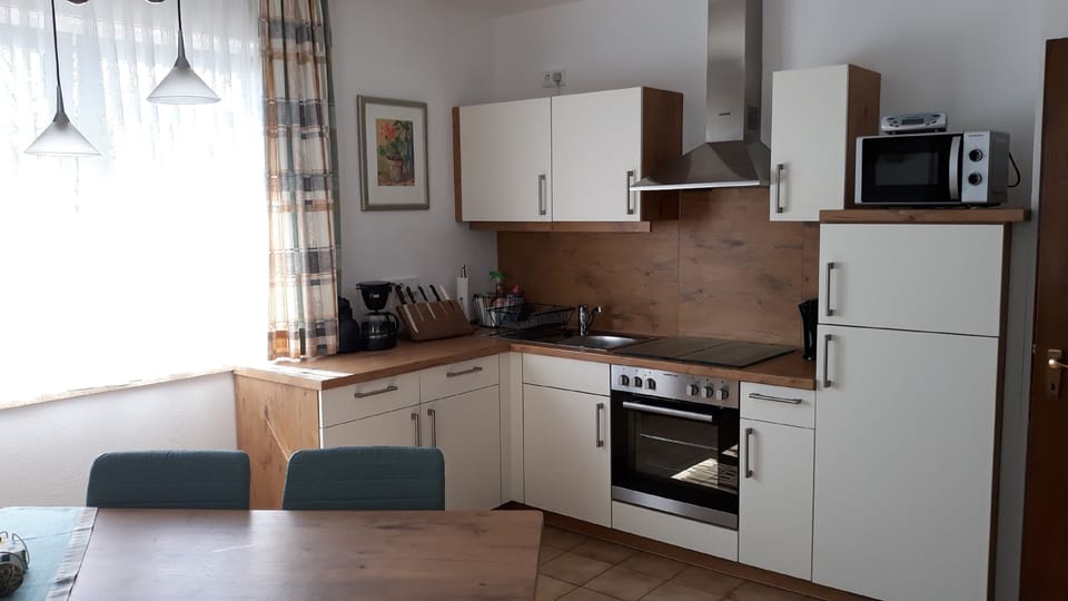 Apartment | Private kitchen | Fridge, microwave, oven, stovetop
