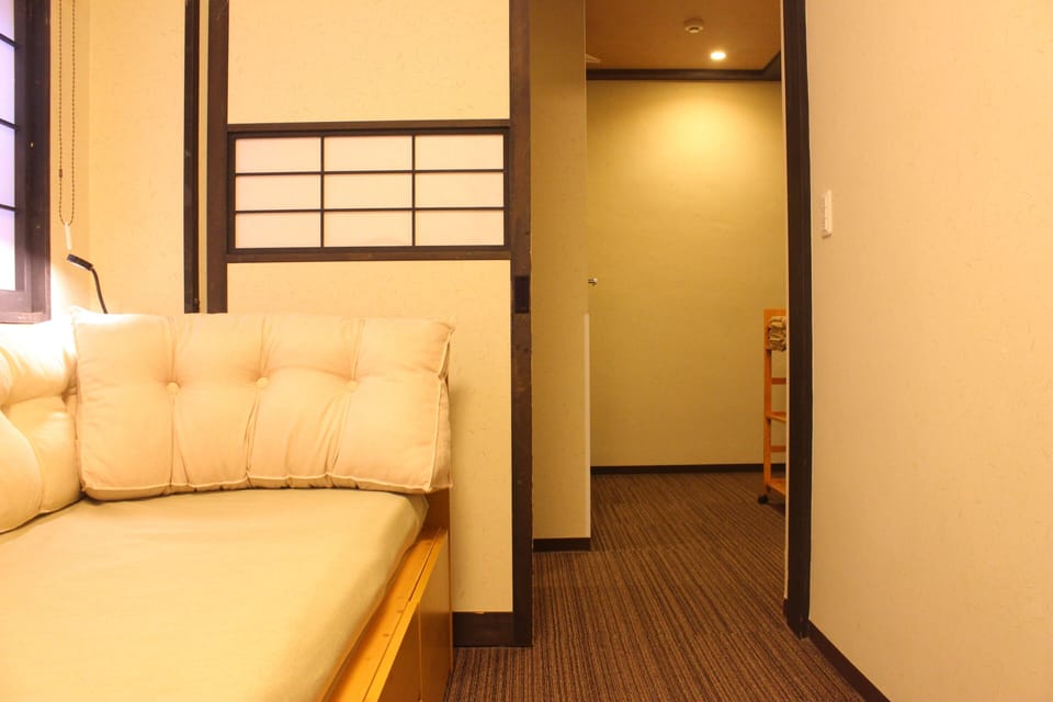 Triple Room, Ensuite (1 bunk bed and 1 mattress) | Blackout drapes, iron/ironing board, free WiFi, bed sheets