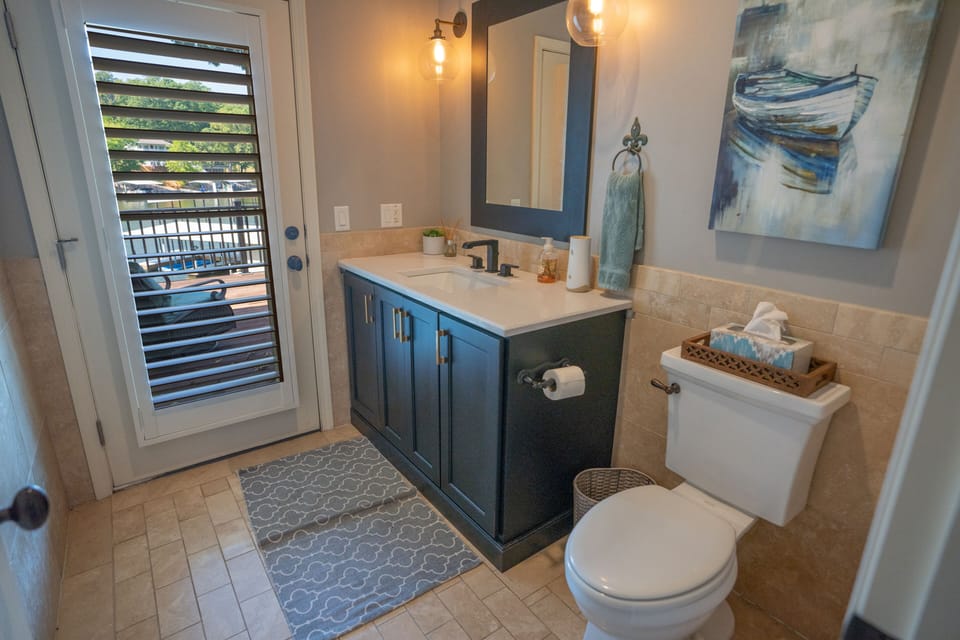 MAIN HOME - Half Bath with bonus door directly onto outdoor deck!