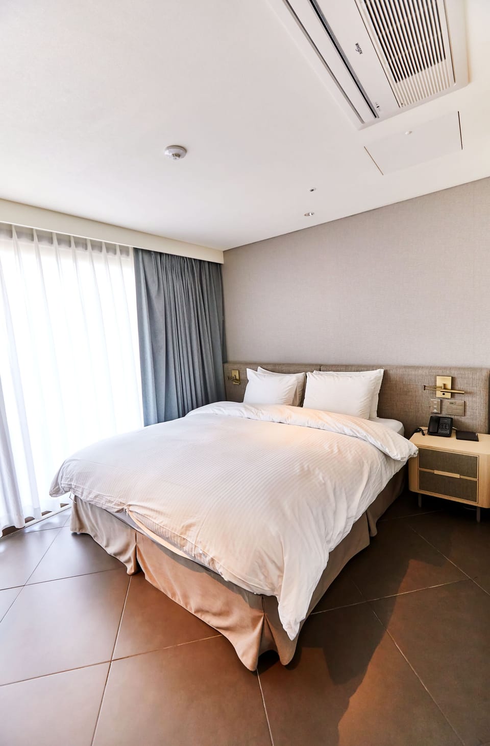 Premium bedding, blackout drapes, free WiFi, bed sheets